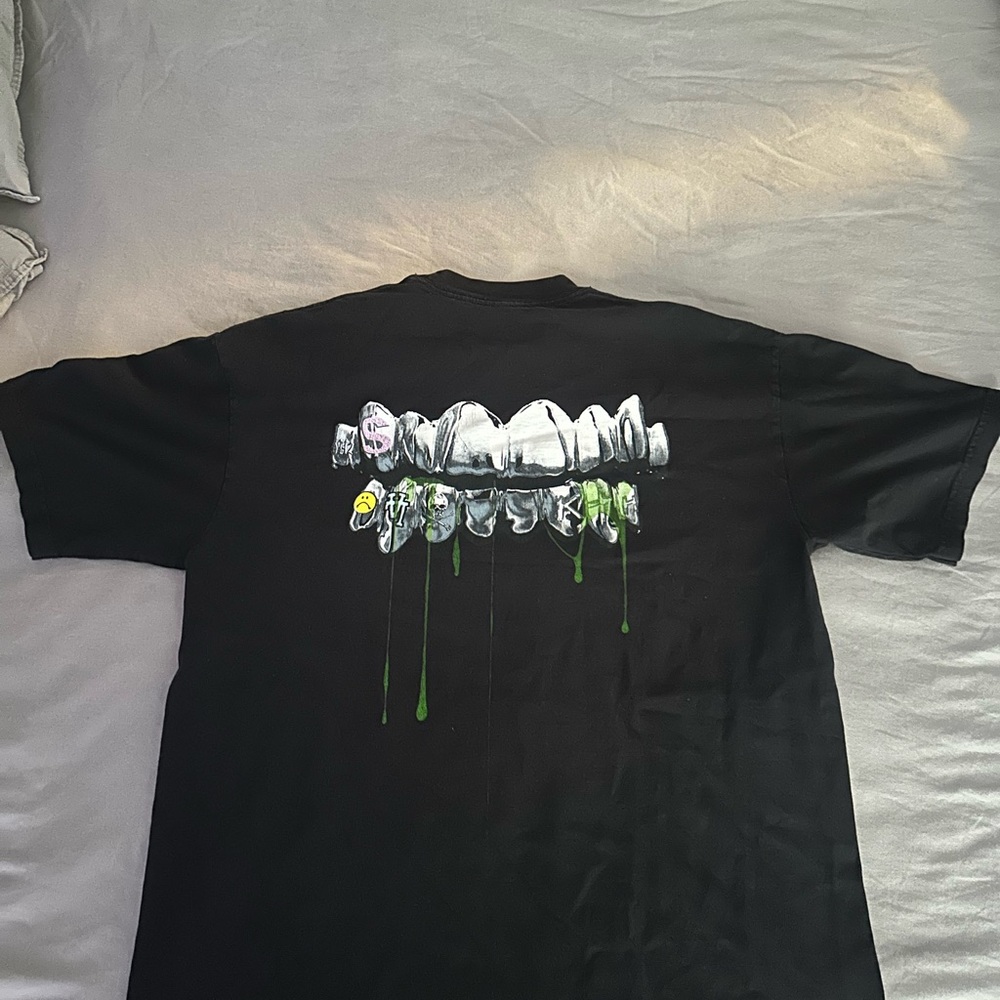 Black Graphic Tee with Dripping Teeth Design
